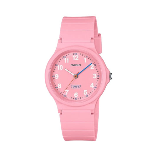 Casio watch with a pink silicone strap and a matching pink round dial, featuring white Arabic numerals and blue hands, shown against a plain white background.